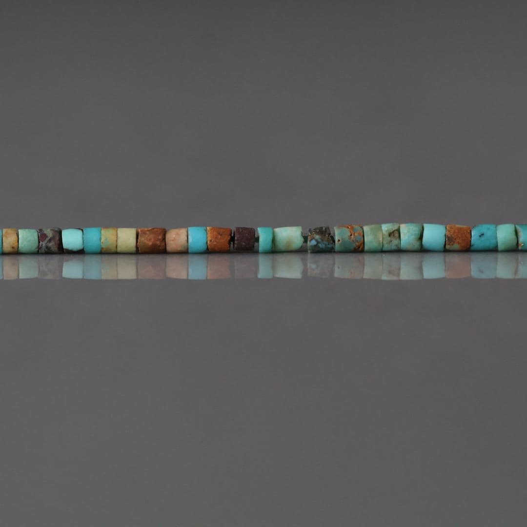 1.5mm Tiny Turquoise Smooth Tube Beads 7"