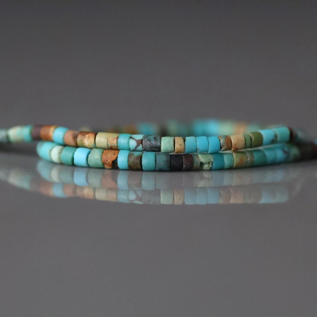 1.5mm Tiny Turquoise Smooth Tube Beads 7"