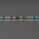 1.5mm Tiny Turquoise Smooth Tube Beads 7"