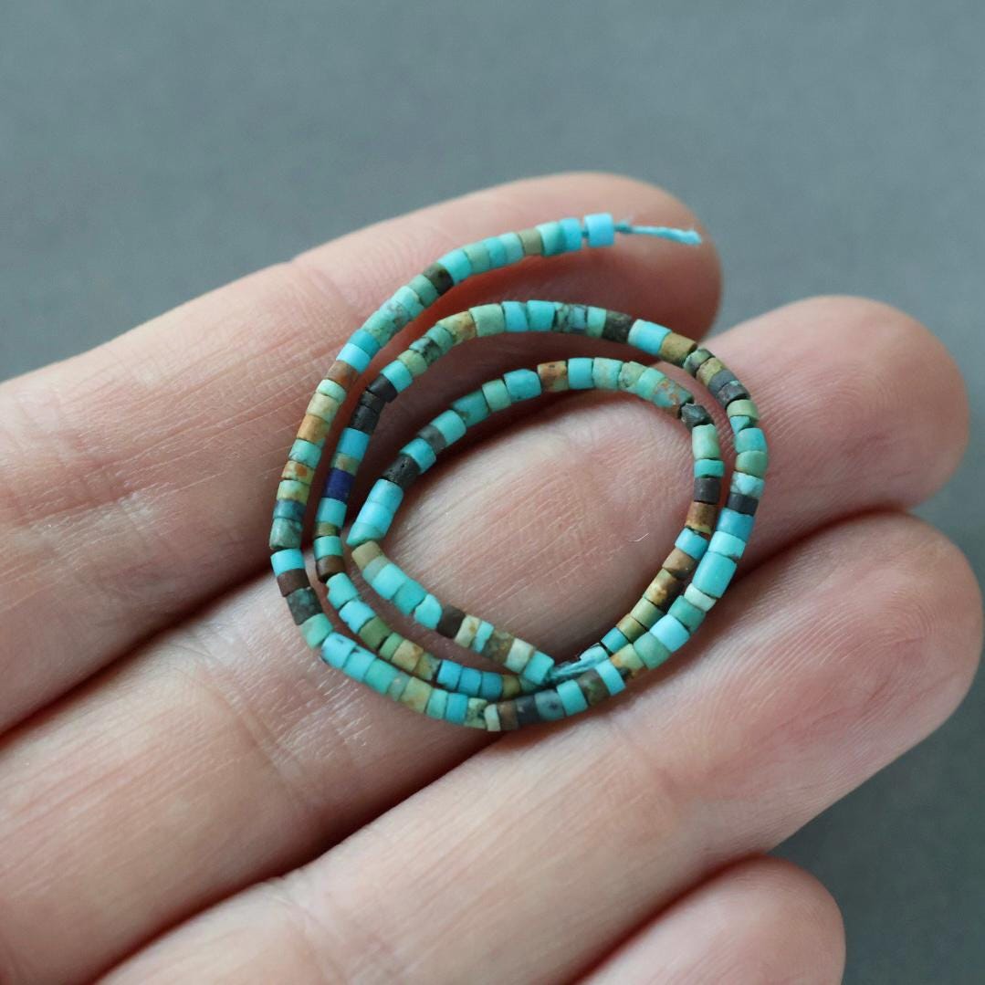 1.5mm Tiny Turquoise Smooth Tube Beads 7"