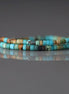 1.5mm Tiny Turquoise Smooth Tube Beads 7"