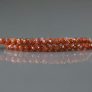 2mm Goldstone Faceted Beads 15