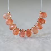 AAA Tanzanian Sunstone Smooth Briolette Beads