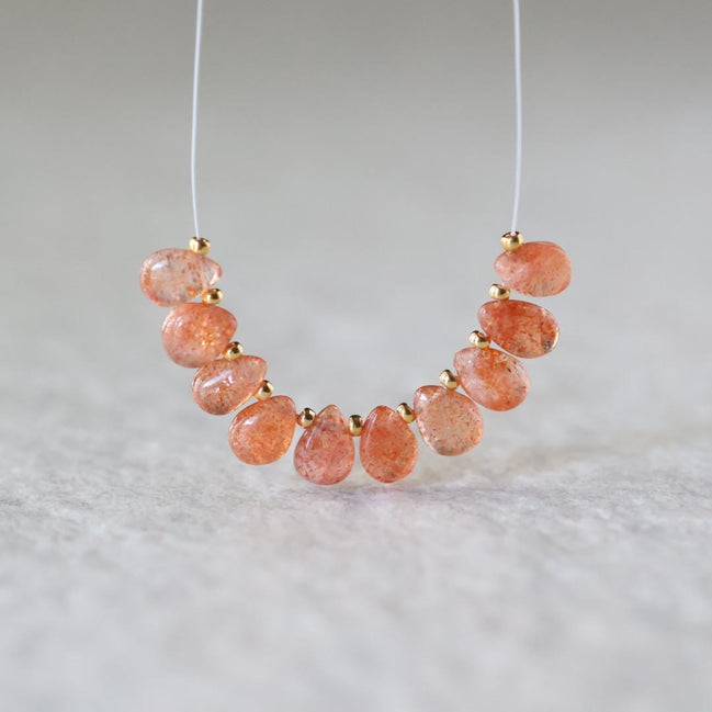 AAA Tanzanian Sunstone Smooth Briolette Beads