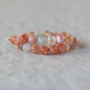 6mm Natural Arusha Sunstone Smooth Beads 7
